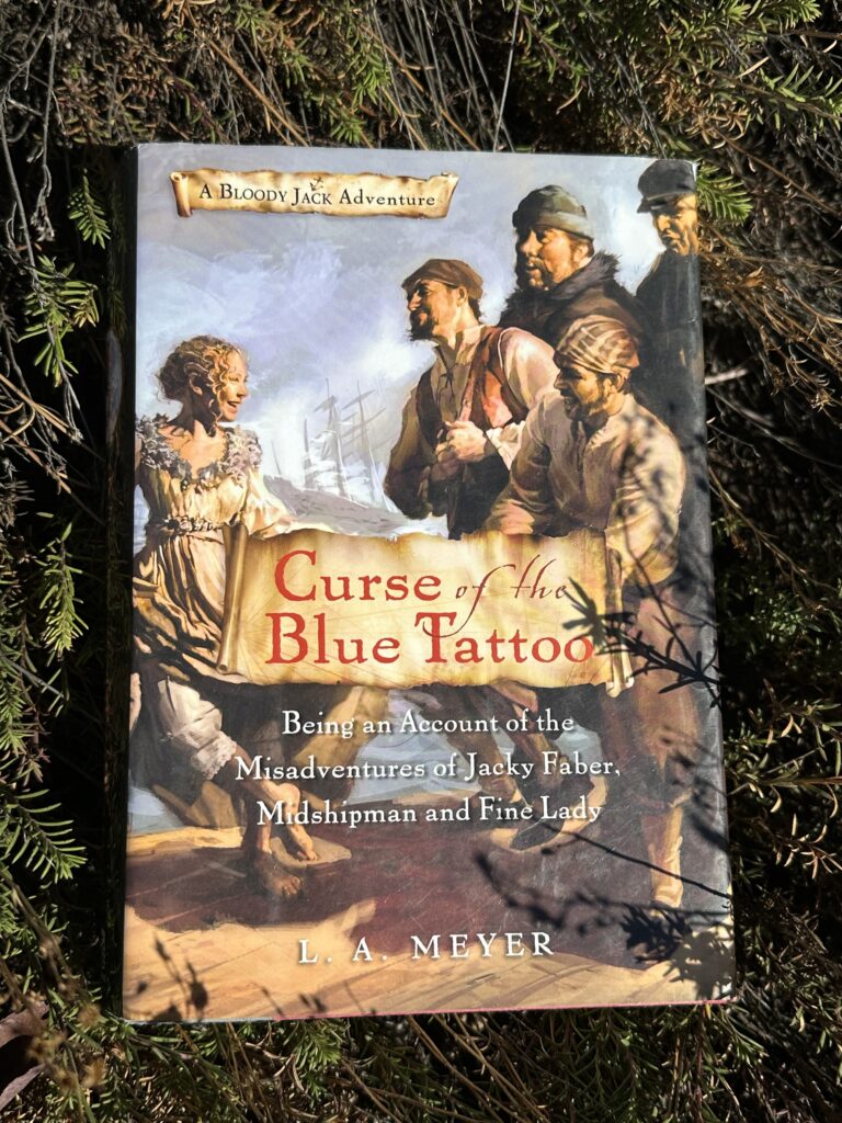 The cover of The Curse of the Blue Tattoo shows a girl dancing on a dock surrounded by sailors