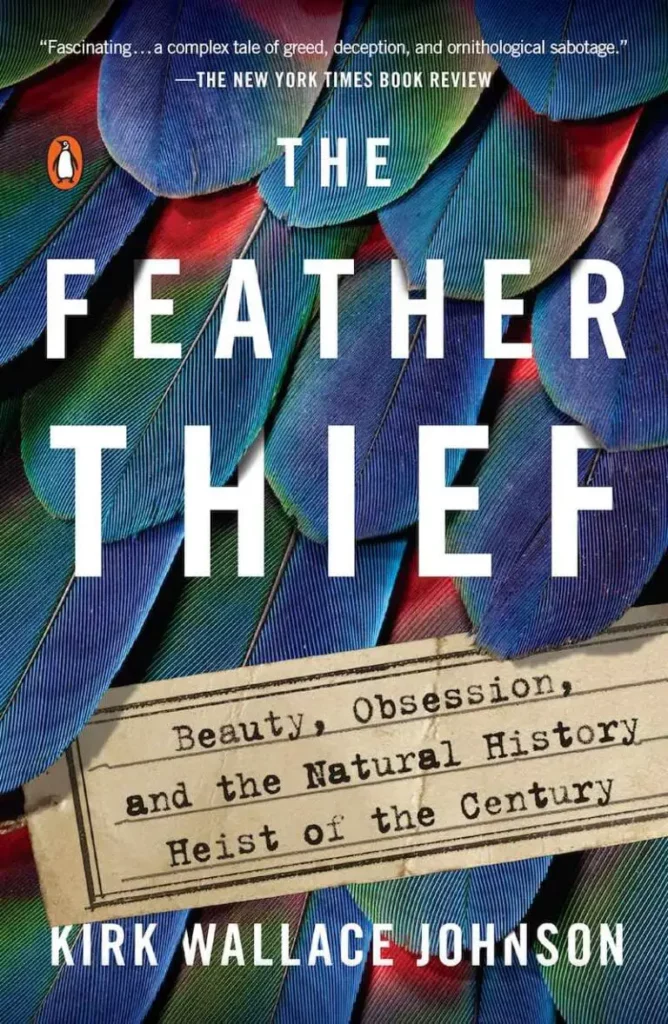 The cover of the Feather Thief by Kirk Wallace Johnson shows a closeup of colorful bird feathers