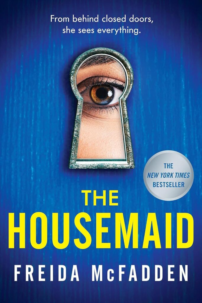 On the cover of The Housemaid, an eye peers through a keyhole in a blue door
