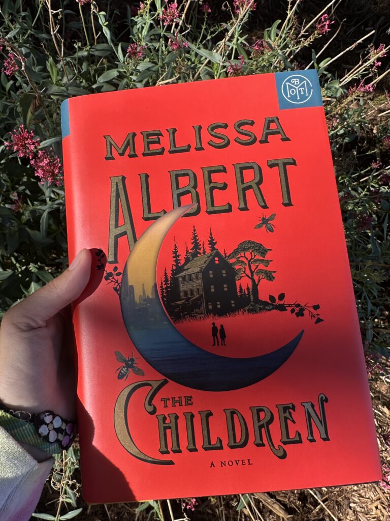 On the cover of The Children, a farmhouse in the woods with two children standing before it; a crescent moon encircles them