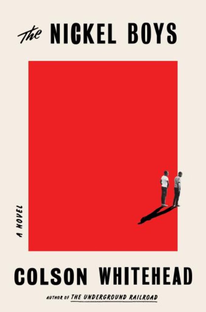 On the cover of The Nickel Boys, two boys stand at the edge of a large red rectangle, their shadows stretching back towards the viewer and combining into one figure